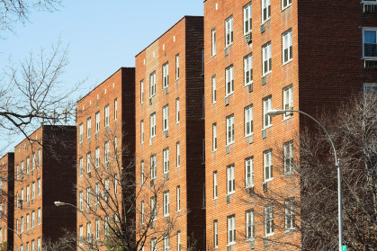 A block of brown apartments in NYC.